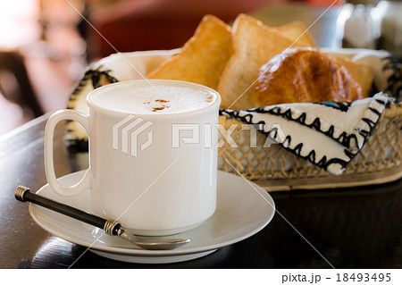 Hot Coffee with Bread in background 18493495
