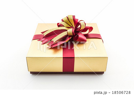 Gold and brown gift box with ribbon bow. 18506728