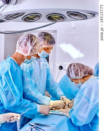 Surgeon at work in operating room. Surgeon at work in operating room. 18515775