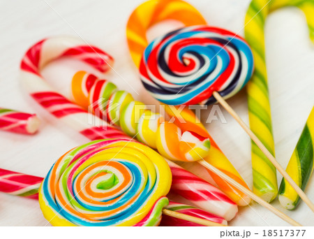 Colorful candy on the wooden background Colorful candy on the wooden background 18517377