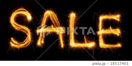 Sparkling inscription of SALE on a black Sparkling inscription of SALE on a black 18517401