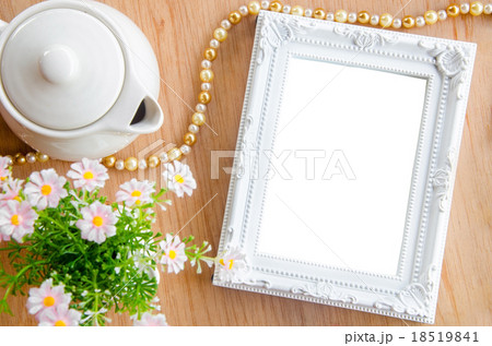Blank photo frame and flower. Blank photo frame and flower. 18519841