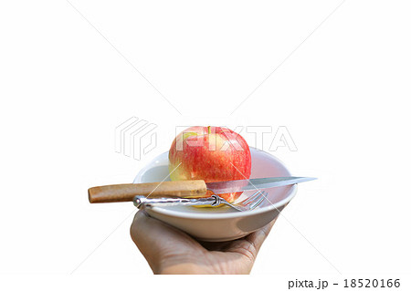 Red apple Fruit on a plate with a knife and fork Red apple Fruit on a plate with a knife and fork 18520166