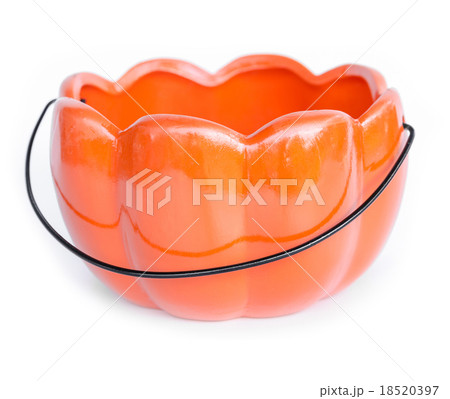 Orange color ceramic pumpkin shape basket. Orange color ceramic pumpkin shape basket. 18520397