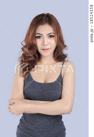 beautiful female model wearing gray tank top 18524358
