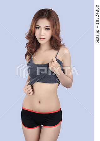 beautiful female model wearing gray tank top beautiful female model wearing gray tank top 18524360
