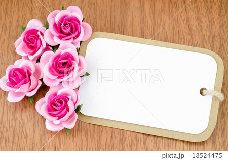 Blank paper tag and pink roses Blank paper tag and pink roses 18524475