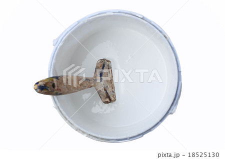 Paint brush in the paint tin isolated 18525130