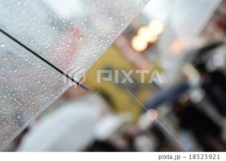 Blur abstract under the umbrella in a rainy day Blur abstract under the umbrella in a rainy day 18525921