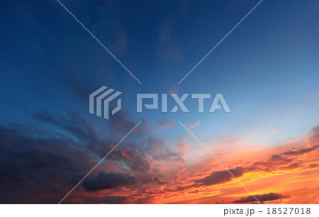 red sunglow clouds in the evening sky 18527018