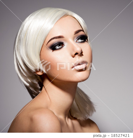 Beautiful girl with short hair. Hairstyle. Makeup 18527421