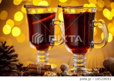 Christmas hot mulled wine with spices on a wooden Christmas hot mulled wine with spices on a wooden 18529693