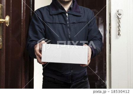 Postman brings a white package Postman brings a white package 18530412
