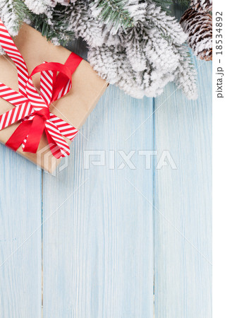 Christmas gift box and tree branch Christmas gift box and tree branch 18534892