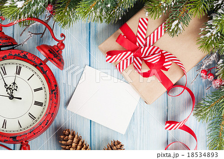 Christmas greeting card over wooden background 18534893