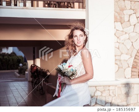 portrait of beatiful bride posing with a bouquet portrait of beatiful bride posing with a bouquet 18535697