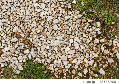 Stone rubble underfoot. Grunge background texture. 18538968