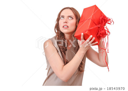 Pretty red haired woman with big present Pretty red haired woman with big present 18543970