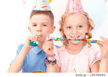 Little boy and girl during birthday party Little boy and girl during birthday party 18546694