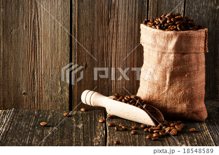 Coffee beans and scoop in sack Coffee beans and scoop in sack 18548589
