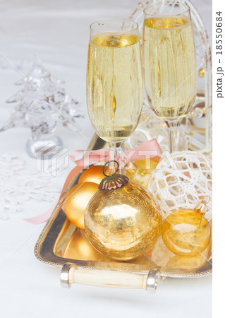 Two glasses of Christmas champagne Two glasses of Christmas champagne 18550684