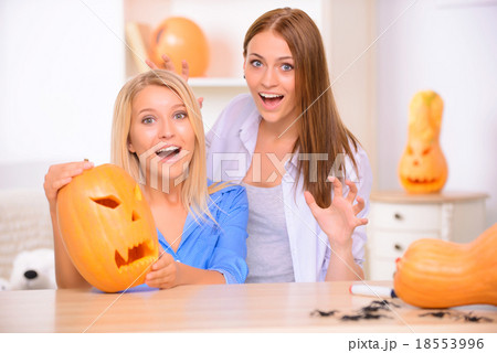 Pretty girls preparing for Halloween party  18553996