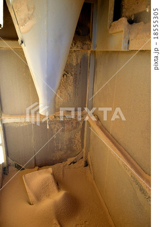 コイン精米機から排出された米ぬかの写真素材