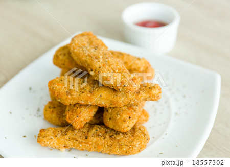 Fresh fried chicken on a white plate Fresh fried chicken on a white plate 18557302
