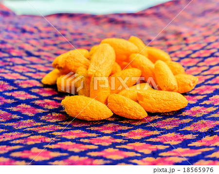 Close up silkworm cocoon on messaline. 18565976