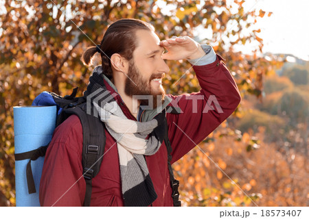 Pleasant tourist having a walk  18573407