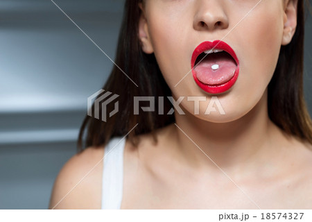 Young girl taking drugs  18574327