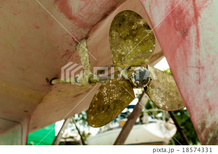 Old brass ship propeller at the shipyard 18574331