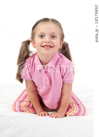 cheerful girl in bed 18579892