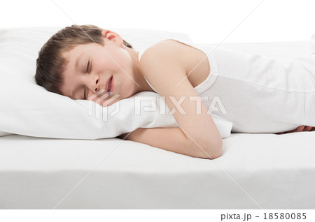 cheerful boy sleep in bed 18580085