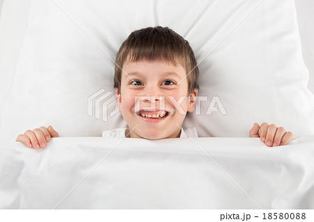 cheerful boy in bed cheerful boy in bed 18580088