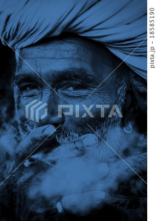 Indigenous Indian Man Smoking Happily Concept 18585190