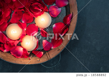 red roses and candles 18588892