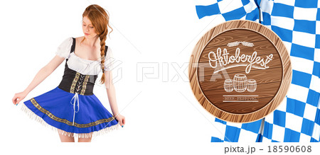 Composite image of oktoberfest girl spreading her skirt Composite image of oktoberfest girl spreading her skirt 18590608