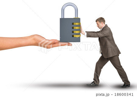 Hand giving keylock to businessman 18600341