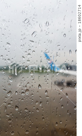 Raindrops on window glass Raindrops on window glass 18602714