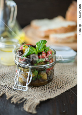 Baked eggplant with tomatoes, garlic and paprika 18605300