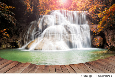 Dreaming of water fall on a empty wooden pier Dreaming of water fall on a empty wooden pier 18609093