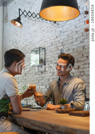 Two Men Cheers Toast Drink Ice Coffee, Asian Mix 18609859