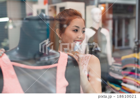 Asian woman shopping choosing fashion dress shop Asian woman shopping choosing fashion dress shop 18610021