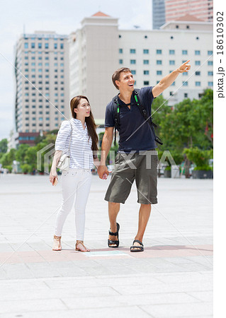Couple asian girl and caucasian man tourist smile Couple asian girl and caucasian man tourist smile 18610302