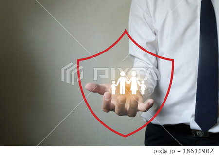 Business man protecting family 18610902