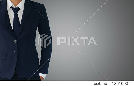 businessman in suit on a white gray background 18610986