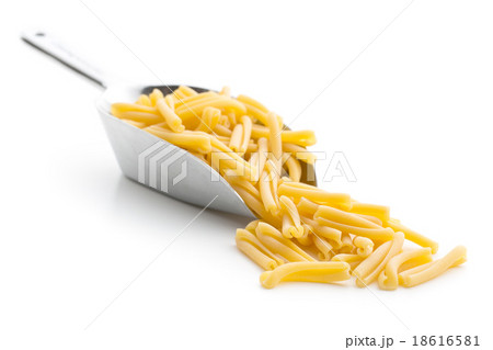 uncooked pasta caserecce in metal scoop uncooked pasta caserecce in metal scoop 18616581