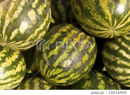 Pile of watermelons on street market. Pile of watermelons on street market. 18616904