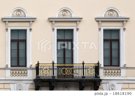 Facade with a balcony. 18618190